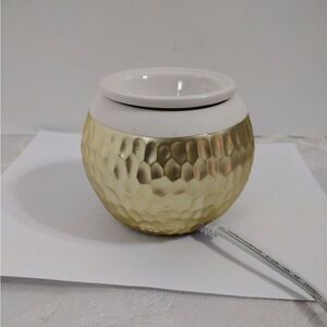 Scentsy element hammered gold wax warmer.